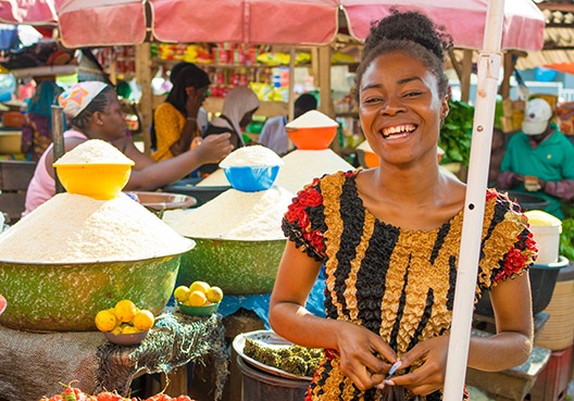 Woman standing in a spice market